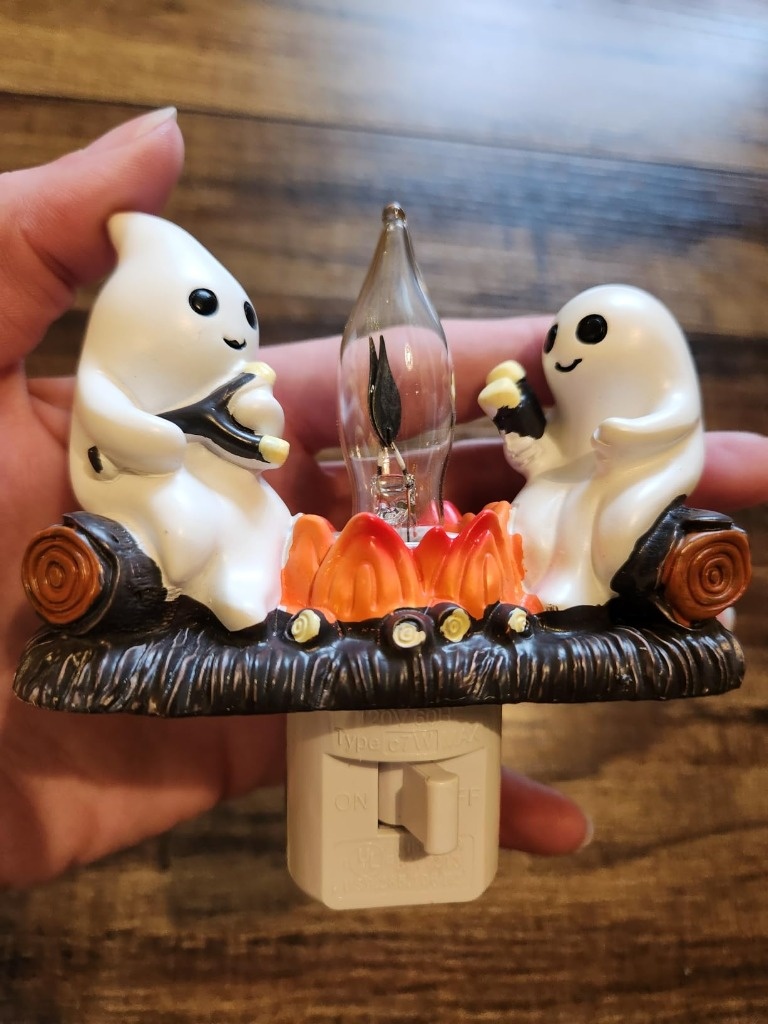 ONLYMISS Ghost Campfire night light held in hand showing sculpt details