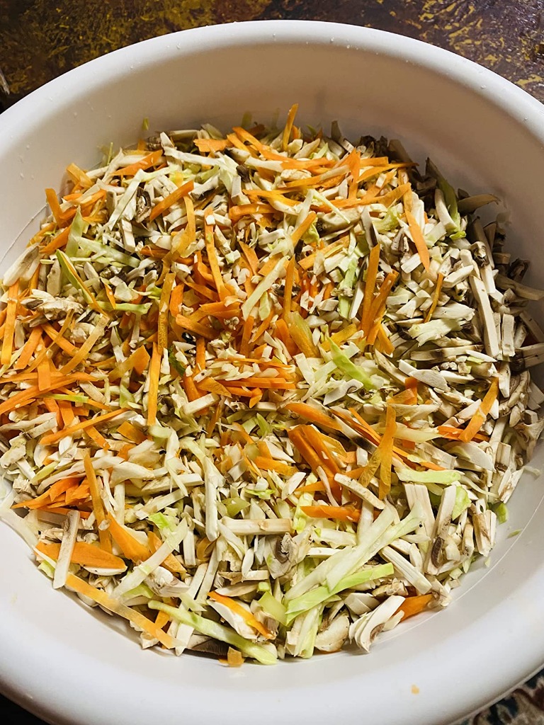 Finely Shredded Coleslaw Cabbage and Carrots in Prep Bowl