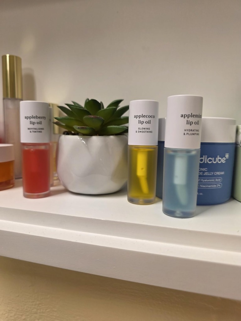 Nooni Lip Oil Shelf Lineup with Succulent