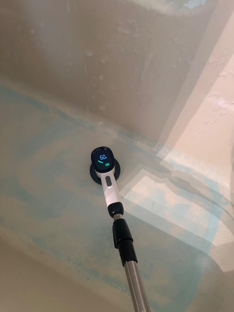 VigorDay Electric Spin Scrubber testing in bathtub with soapy foam